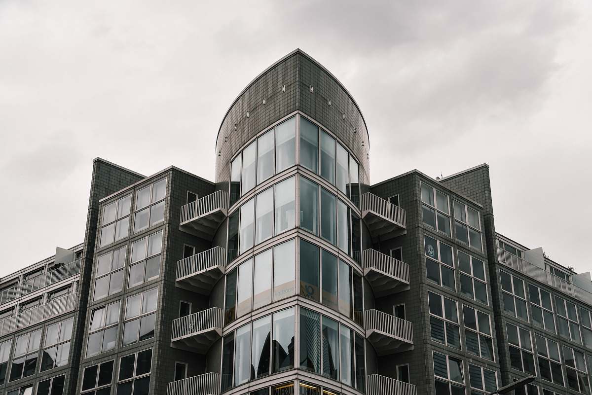 office building black building during daytime city